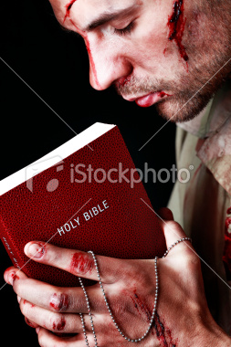 Ist2_11885634-wounded-soldier-holding-bible